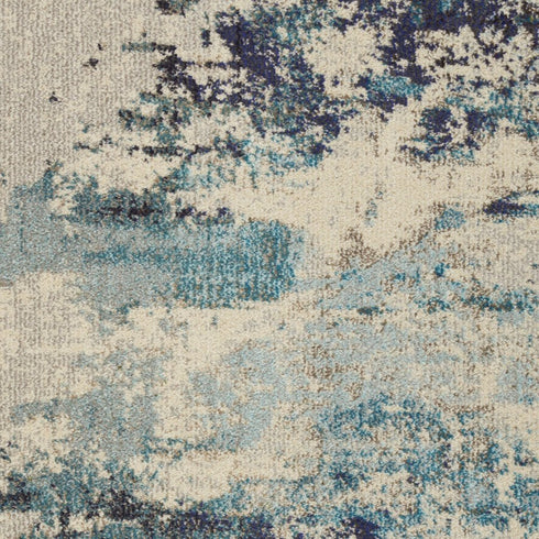 2' X 4' Ivory And Teal Blue Abstract Power Loom Non Skid Area Rug